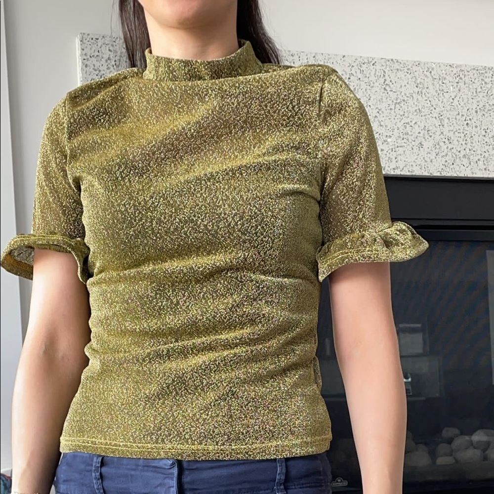 Brand new shin gold top size S